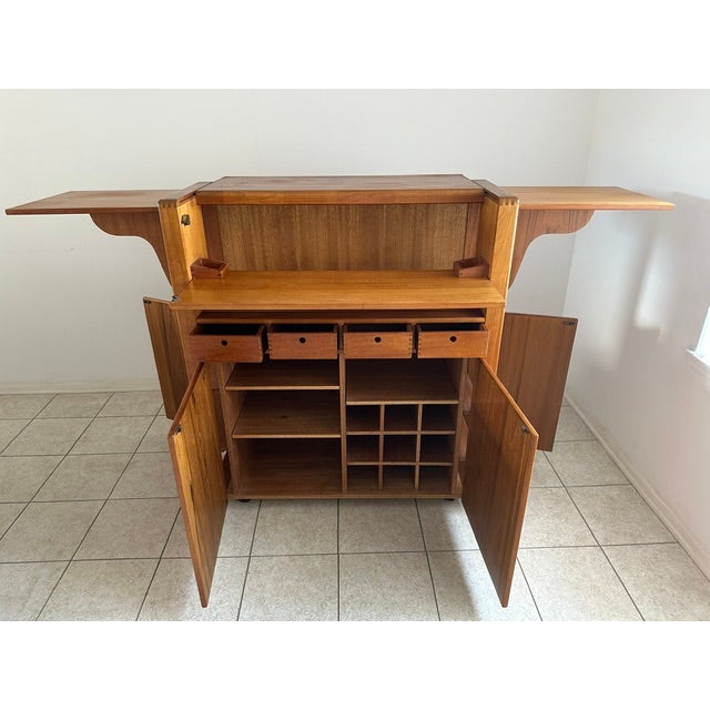 d-SCAN Captain Line solid teak convertible bar service with rounded corners; expanding cabinet with front and side doors &...