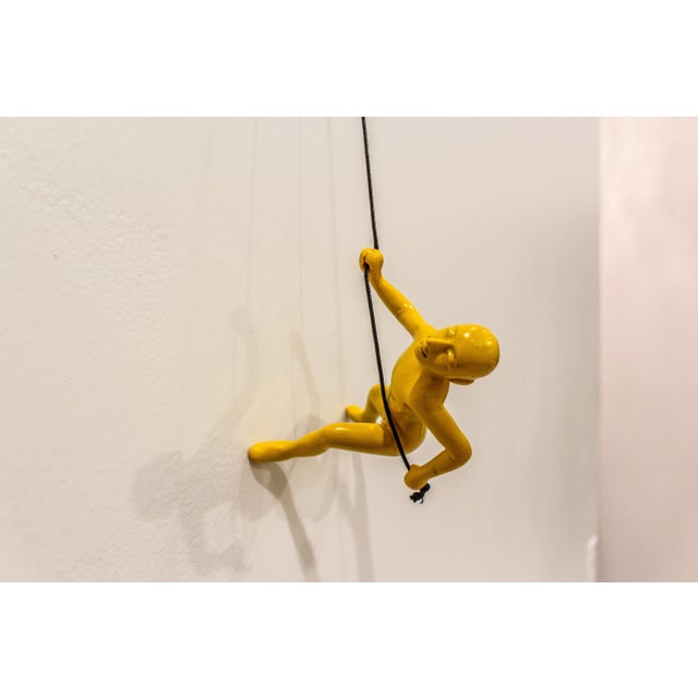 Our vibrant YellowClimbing Man is a beautiful addition to your wall decor! Curate your own collection with our variety of...