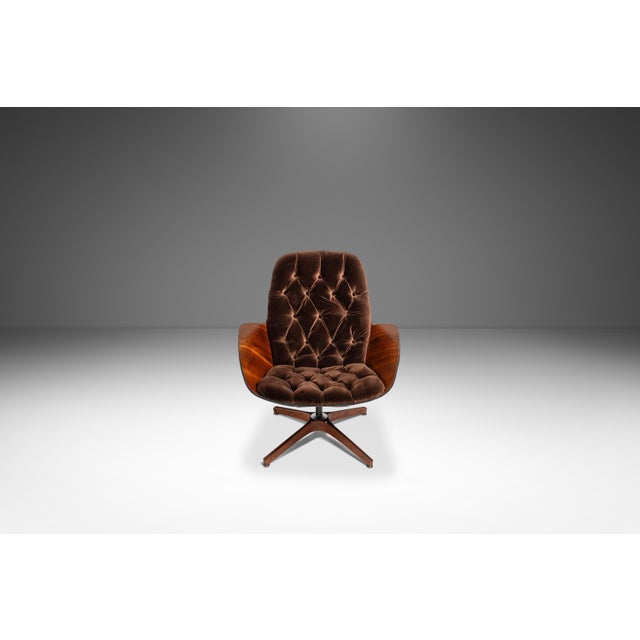 Introducing a true Mid Century Modern masterpiece: the Low Back Swivel Lounge Chair designed by lauded George Mulhauser....