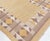 Radiating warmth and Scandinavian elegance, this vintage Swedish flat woven rug, signed with the initials "JR," is a...