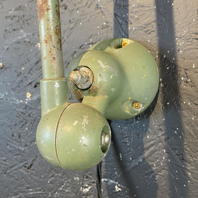 Beautiful original green Jielde two arm wall light. Designed by the French engineer, Jean-Louis Domecq, in the 1950s to be...