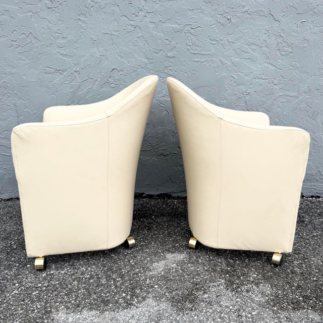 This pair of vintage postmodern club chairs by Thayer Coggin combines sculptural form with effortless mobility. Each...