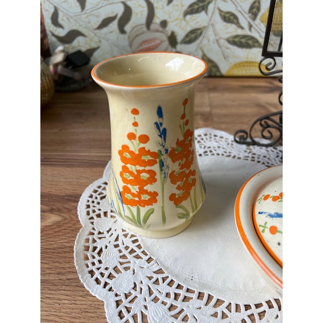 Up for consideration is a beautiful vintage pair of hand painted ceramic floral dishes, that includes a vase and bowl with...