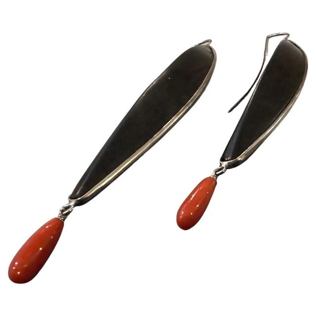 These earrings are striking examples of 21st-century modern design, blending organic and minimalist aesthetics with bold...