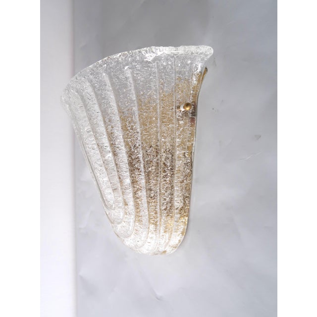 Wall Light in Murano Glass, in Very Good conditions. Designed 1980 to 1989 European Plug (up to 250V).The wiring of this...