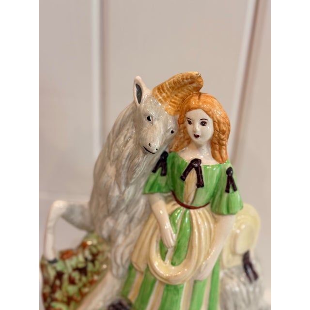 Bring traditional English charm to your mantle or bookshelf with this delightful mid-20th-century ceramic figurine titled...