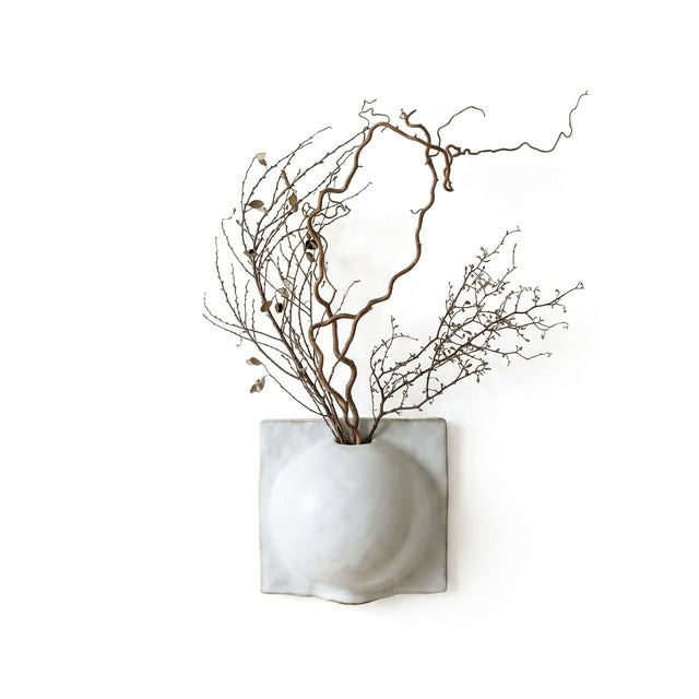 This minimalist studio pottery vase features a unique geometric form that makes it a striking sculptural piece. Recently...