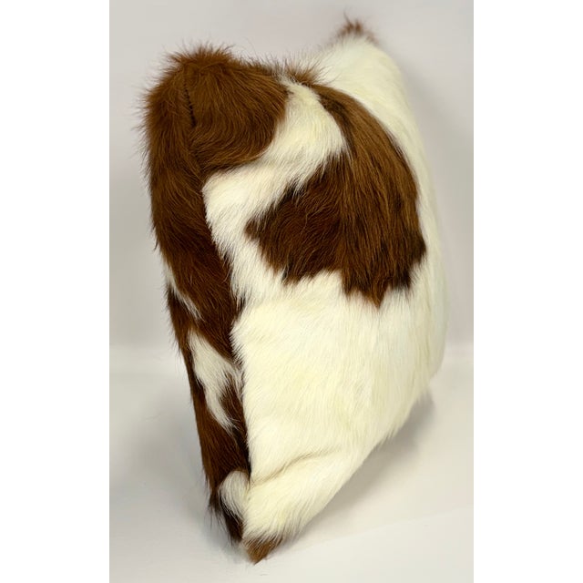 Striking and richly textured, this 16” x 16” pillow cover is crafted from genuine long-haired premium Colombian cowhide in...