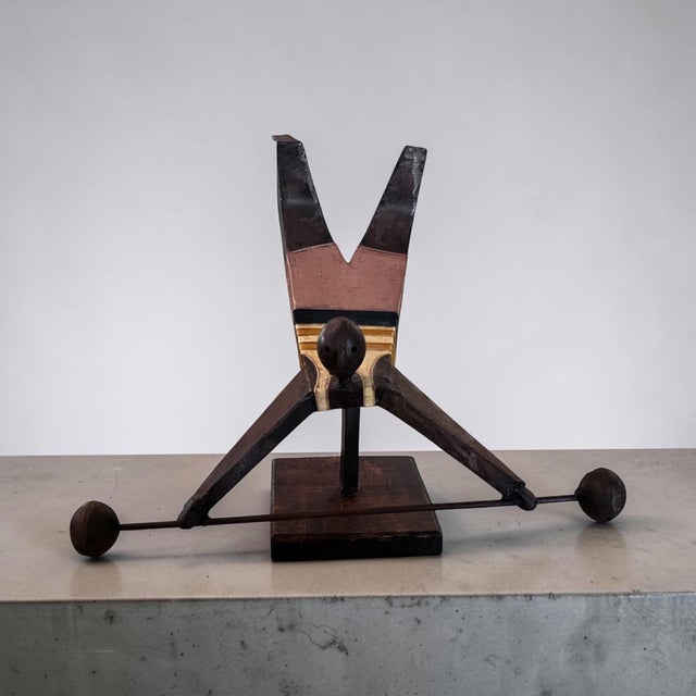 A rare signed modernist tabletop sculpture by celebrated Mexican artist Manuel Felguérez. Executed in painted wood and...