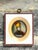 This exquisite 19th-century portrait miniature is a masterful hand-painted rendition of the iconic "Man with the Golden...
