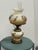Design Plus Gallery presents the Gone with the Wind Hurricane Lamp. Known as the GWTW as it was famously named after their...