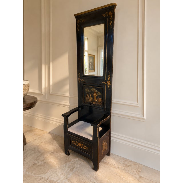 Elegant vintage chinoiserie hall tree featuring a striking black lacquer finish, intricate hand-painted gold decoration,...