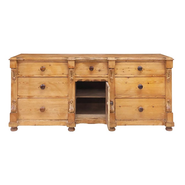 A dresser of genuine presence and country refinement, this antique English Victorian pine kitchen dresser dates to the...
