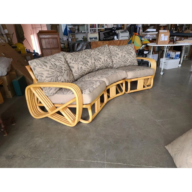 Indulge in the timeless elegance of this meticulously restored Four-Strand Square Pretzel Corner Rattan Sectional Sofa, a...