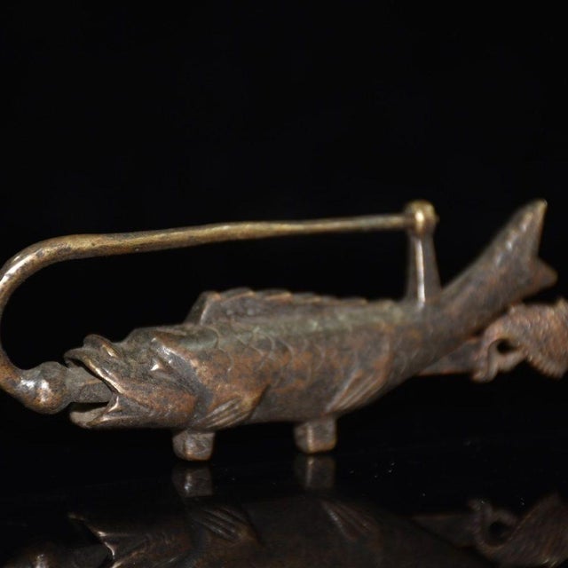 This captivating Vintage Chinese Brass Carp Padlock is a brilliant blend of traditional folk art and clever mechanical...