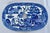 An exceptional 19th-century English blue and white transferware pottery platter drainer (also known as a mazarin). This...