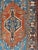 Measures: 3'10 x 5'7 Antique Persian Karadjeh rug with tribal medallion in rust red and bright blue. Keivan Woven Arts rug...