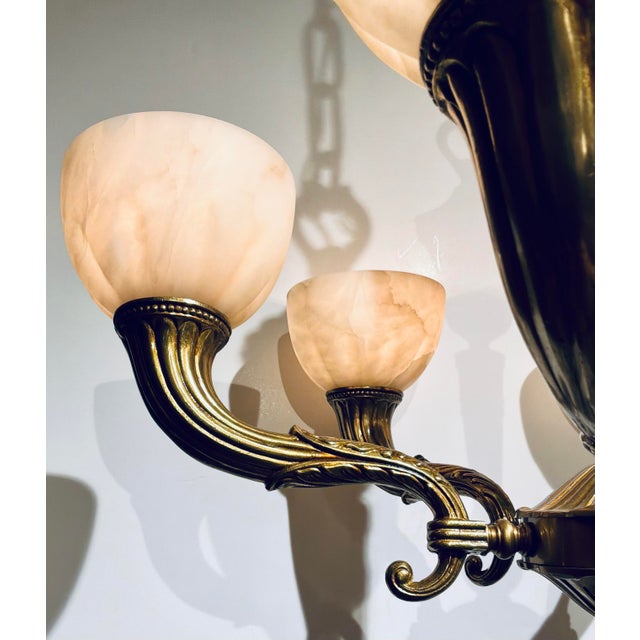 Original retail $5248, traditional Myran Allan Luxury Lighting Neoclassical Bronze and Alabaster Chandelier, Dutch gold...