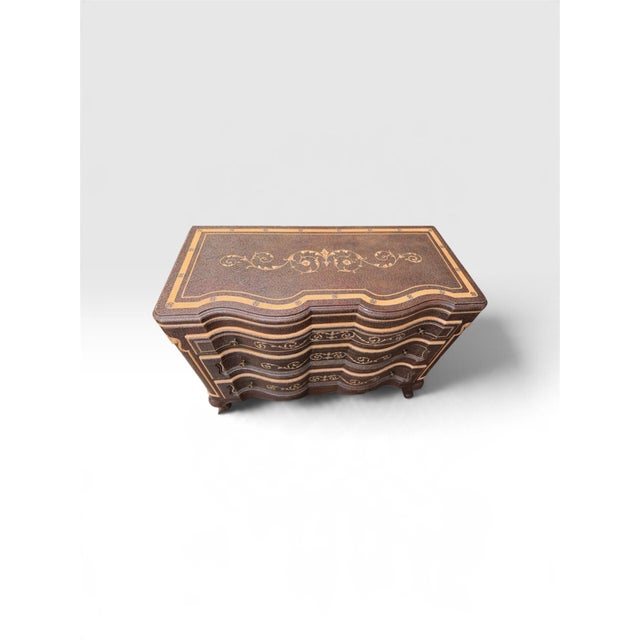 An exceptional vintage three-drawer serpentine chest by luxury furniture maker Maitland-Smith, beautifully handcrafted and...