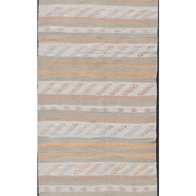 Measures: 2'9 x 12'6 Vintage Turkish Kilim Runner in Soft Cream, Beige, and Peach Tones 2'9 x 12'6. Keivan Woven Arts /...