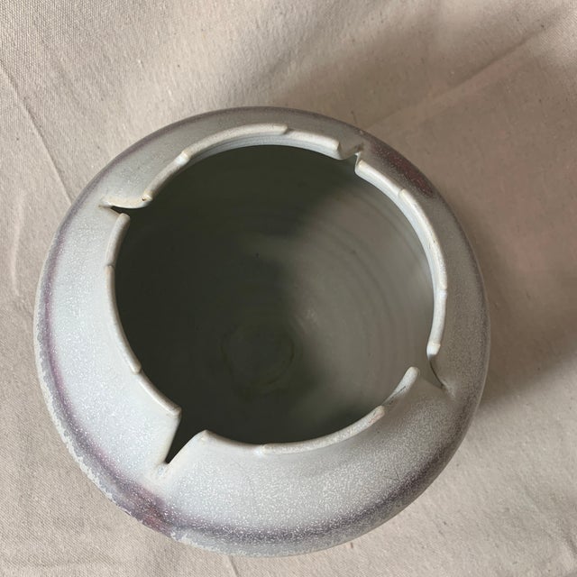 Mid-century pottery vase, in a neutral gray background with white, purplish brown and blue hues, marbled swirl glaze....