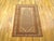 An antique Persian Hamadan Camel Hair oriental rug, size 6'3" x 4'0", circa 1920. This handsome hand-knotted wool carpet...