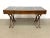 Vintage campaign-style writing desk by Brandt Cabinet Works, featuring a distinctive double trestle base, inset dark top...