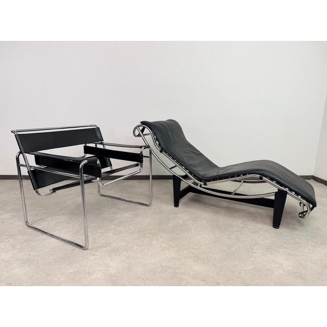 Vintage LC4 Chaise Longue by Le Corbusier in Black Leather. Inspired by the world's most famous chaise longue design,...