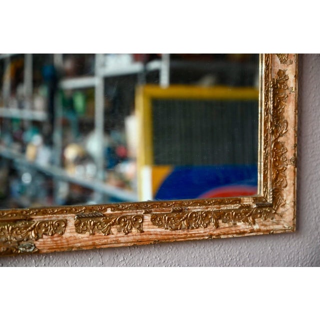 A mirror with a history, brimming with emotion! This beautiful 1900s wall mirror captivates from the start with its wooden...