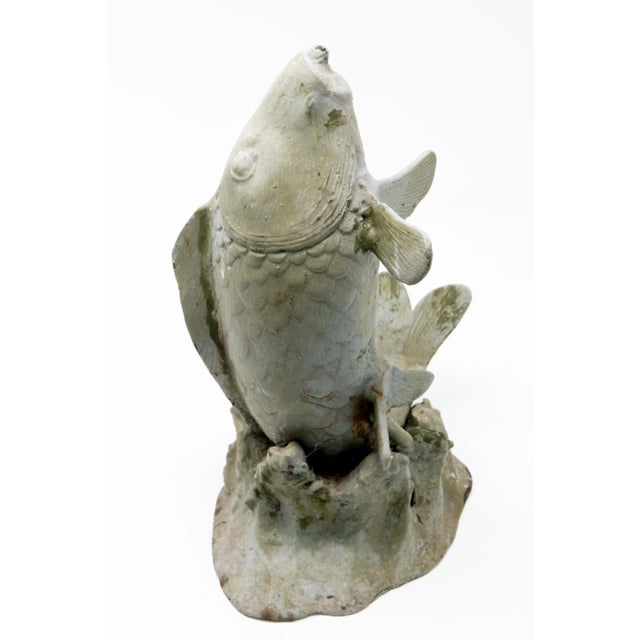 This cast metal fish fountain head will look great in any water element. Hand cast and aged beautifully. Has a spout up...