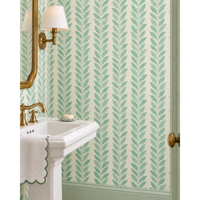 Bring a burst of joy to your walls with our Garden Leaf Stripe Wallpaper, a classic stripe reimagined with hand-painted...