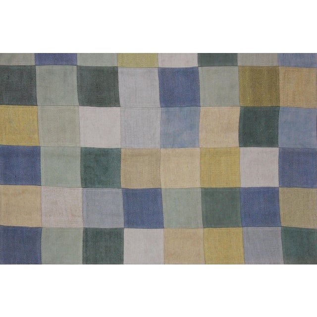 A beautiful Vintage Patchwork Kilim . It's in very good condition, practically new. This Patchworks kilim is produced of...