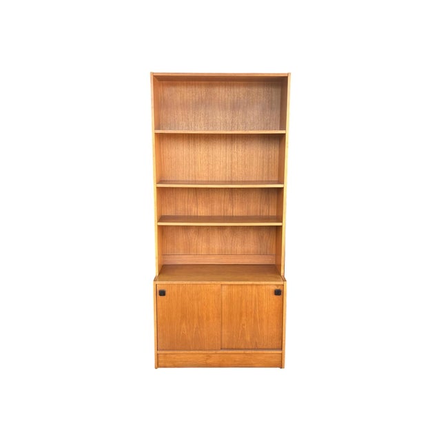 This handsome 1960s Danish Modern bookcase embodies clean Scandinavian design and warm, natural wood tones. Its tall,...