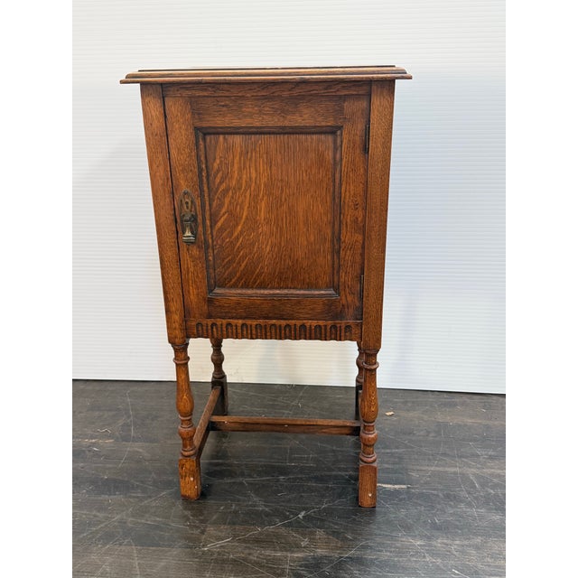 Design Plus Gallery presents a Jacobean Revival Nightstand from Waring & Gillow of Lancaster. This small bedside cabinet...