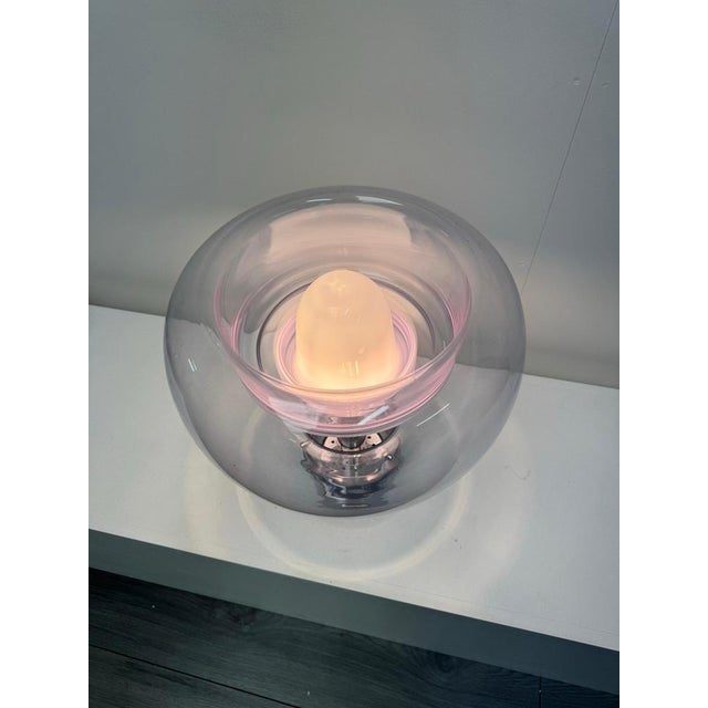 Hand blown art glass table lamp resting on a chrome base designed by Toni Zuccheri for Ve Art C1970 . Features include...