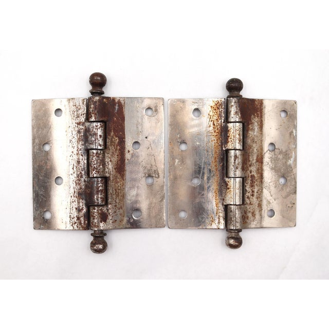 These door hinges are made of brushed finish steel with ball tips, five knuckles, and a staggered hole pattern. The...