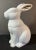 Beautiful two piece white figural rabbit cookie jar with gold ears. Perfect condition.