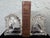 This striking pair of vintage clear pressed-glass horse head bookends was produced by Federal Glass Company in the 1940s,...
