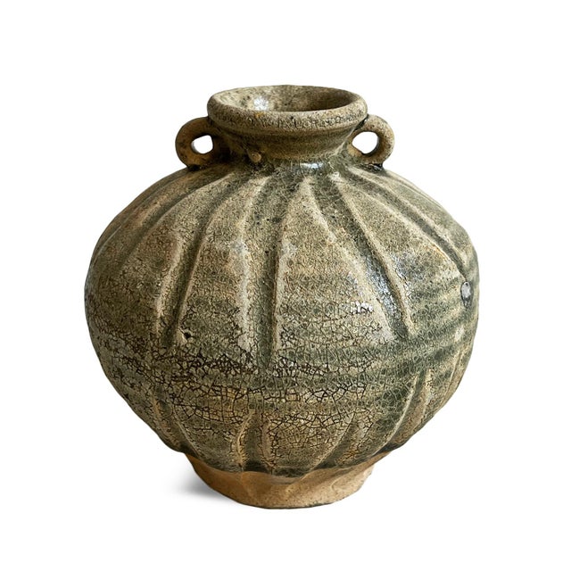 Antique small earthware pot from the coast of Indonesia. Wonderful used as a small vase or displayed as is; in groupings...