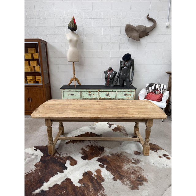 This antique solid oak farmhouse table has been completely restored. It features a beautiful oblong tabletop that gives it...