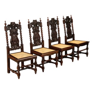 Set of Four 19th Century Renaissance Revival Carved Chairs With Cane Seats For Sale