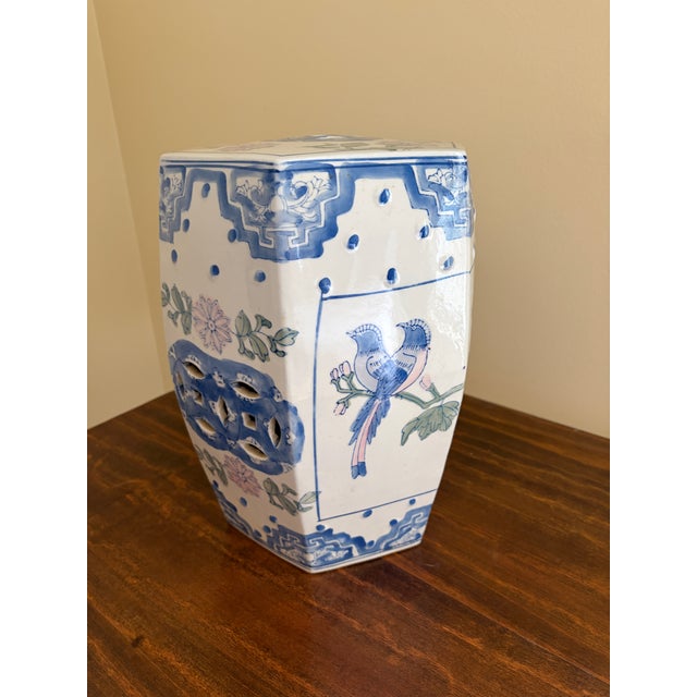 A gorgeous Chinoiserie blue, white, pink, and green hexagonal porcelain garden stool, plant stand, or small side table...