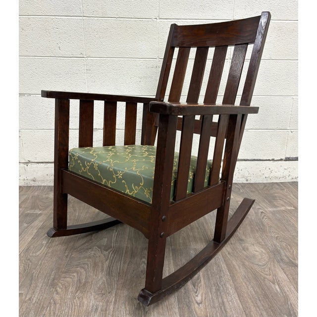 This is a gorgeous antique American Arts & Crafts Mission oak rocking chair, circa 1905–1925. Features solid quarter-sawn...