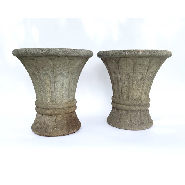 A charming pair of vintage French fluted planters, manufactured by Grandon Fres, beautifully sculpted with a waisted...