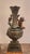 This listing features a pair of patinated bronze cherub ornamental vases in an Art Nouveau style of decoration. The vase...
