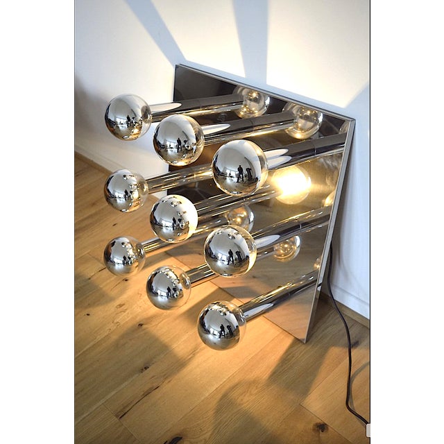 Large, imposing mid-century design lamp by Japanese designer Motoko Ishii for Staff. The lamp features a mounting base...