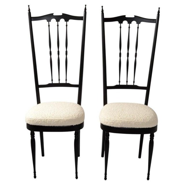 Pair of fully restored Pozzi and Verga attributed sculptural wooden chairs made in Italy, circa 1950. Great crafted two-...