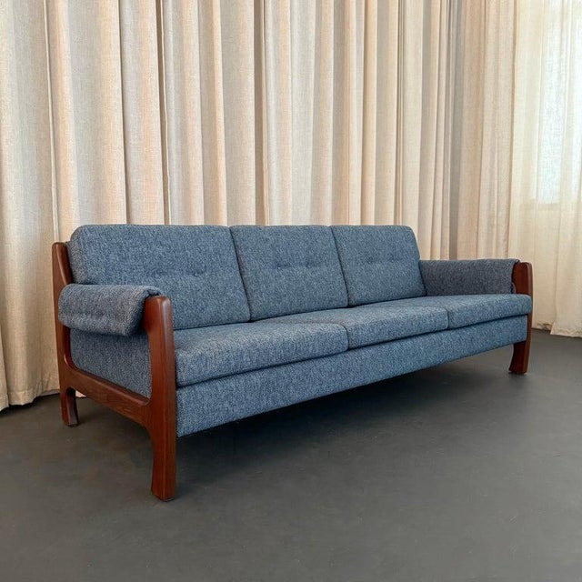 This low-profile Scandinavian Modern three seat sofa was manufactured by premiere Danish maker Selig in the 1960s. The...