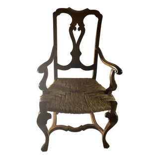 This Is a 19th-Century Venetian Baroque Armchair Crafted From Hand-Carved Walnut With a Hand-Woven Rush Seat. Hand Carved Walnut Rustic Arm Chair. For Sale