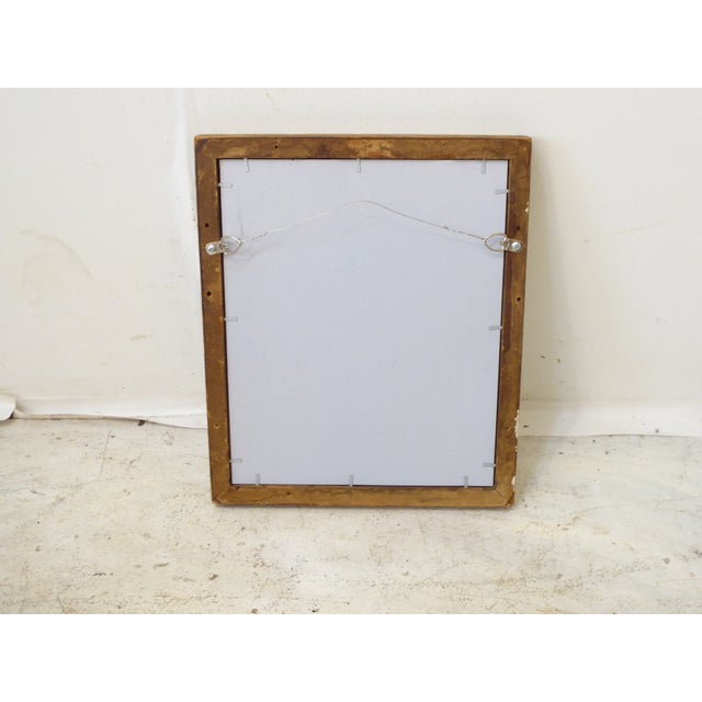 This small silvered accent mirror measures 12.75"H x 10.5"W.